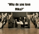 a group of people are sitting in a room with the words " why do you love mika " on the top