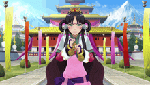 a girl in a pink dress is standing in front of a temple