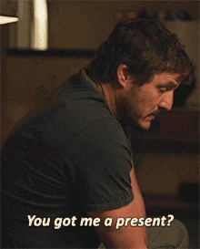 The Last Of Us Joel Miller GIF - The Last Of Us Joel Miller You Got Me A Present GIFs