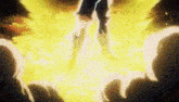 a person is standing in front of a fireball in a dark room .