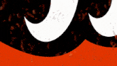 a black and orange striped background with a shark 's head on it