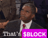 a man in a suit and tie with a purple sign that says that 's $ block
