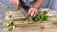 Slicing Brussels Sprouts Jill Dalton GIF - Slicing Brussels Sprouts Jill Dalton The Whole Food Plant Based Cooking Show GIFs
