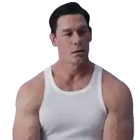 a man wearing a white tank top looks to his left