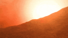 the sun is shining through the trees on a hill