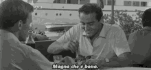 vittorio gassman black and white eating meal