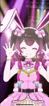 a girl in a pink dress with bunny ears and a microphone