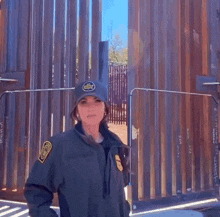 a woman wearing a hat that says " border patrol " on it