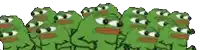 a group of green frogs are standing next to each other .