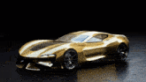 a gold car is parked on a black surface