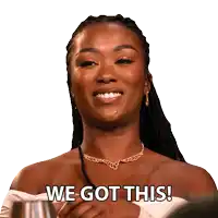 a woman is smiling with the words we got this written on her chest
