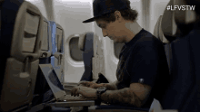 airplane writing laptop typing serious