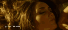 a woman is kissing a man on the forehead with the hashtag @dmstreams