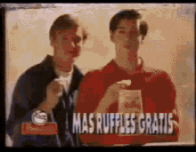 two men are standing next to each other with the words mas ruffles gratis