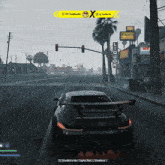 a car is driving down a street in front of a liquor sign