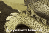 a statue of a dragon with the words " fuck you * swims horizontal " on the bottom