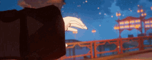 a close up of a person 's hand in a video game with a bridge in the background .