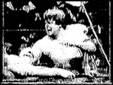 a black and white photo of a person laying on the ground