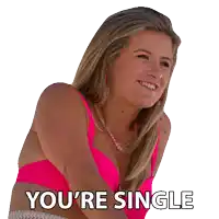 a woman in a pink bikini is smiling with the words you 're single below her