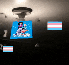 a transgender flag is next to a picture of steven universe