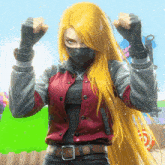 a woman with long blonde hair is wearing a mask