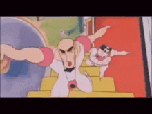 a couple of cartoon characters are standing on top of a slide .