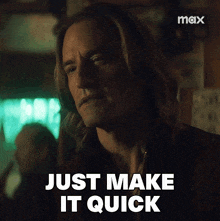 a man with long hair says just make it quick in a dark room