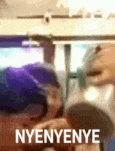 a blurry picture of a person with the words nyenyenye written on the bottom