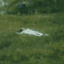 resting lili ann de francesco my body song taking a break lying on the grass
