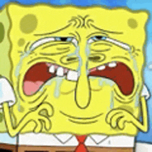 a close up of spongebob squarepants crying with his mouth open .