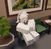 a girl with white hair is sitting on a green chair with boxes on her legs