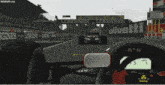 a race car with the word canon on the back of it