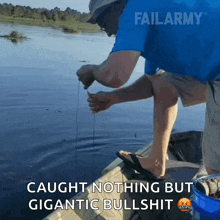 a man in a blue shirt is fishing in a boat and the caption says caught nothing but gigantic bullshit