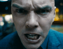 a close up of a man 's face with the word kepler on the bottom right