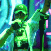 a woman in a green hat is holding a gun in her hands .