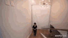 a woman is walking up a set of stairs made in animotica
