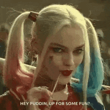 harley quinn from suicide squad is holding a lollipop and saying `` hey puddin , up for some fun ? ``