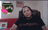 a woman wearing a black shirt that says ministrations