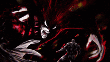 a man is standing in front of a monster with a red haired face .