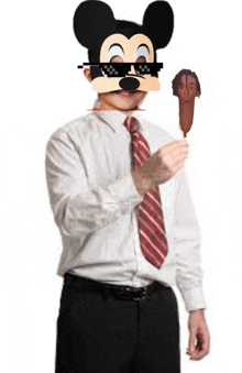a man wearing a mickey mouse mask and sunglasses is holding a hot dog