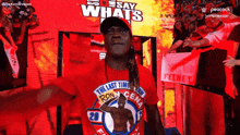 a man wearing a red shirt that says the last time ron cena on it