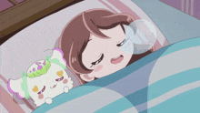 a cartoon girl is sleeping next to a stuffed animal with the number 8 on it