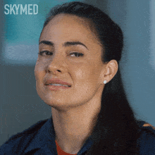 a close up of a woman 's face with the words skymed on the bottom