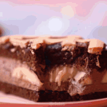 a piece of cake with a bite taken out of it is on a plate with the words mr cakes written on it