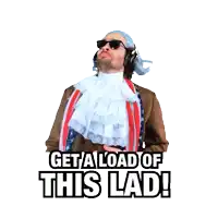 a man wearing a wig and sunglasses is pointing up with the words get a load of this lad below him