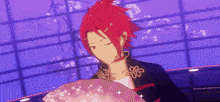 a person with red hair is holding a fan