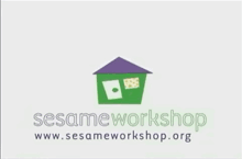 a logo for sesame workshop with a house and a star on the roof