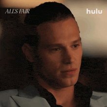 a close up of a man 's face with the words all 's fair above him