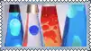 a collage of four lava lamps with different colors of lava .