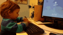 baby typing computer cute